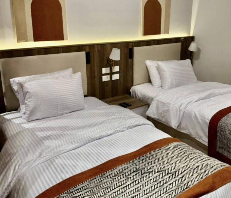 Twin beds in a G-Remal Hotel suite
